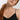 HANRO black seamless V-neck camisole in mercerized cotton with satin trim and adjustable straps, perfect for layering or wearing alone.
