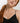 HANRO black seamless V-neck camisole in mercerized cotton with satin trim and adjustable straps, perfect for layering or wearing alone.