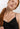 HANRO black seamless V-neck camisole in mercerized cotton with satin trim and adjustable straps, perfect for layering or wearing alone.