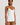 HANRO white seamless V-neck camisole in mercerized cotton with satin trim and adjustable straps, perfect for layering or wearing alone.