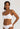HANRO Touch Feeling white spaghetti strap crop top in soft microfiber with seamless finish and light bust support for versatile wear.