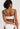 HANRO Touch Feeling white spaghetti strap crop top in soft microfiber with seamless finish and light bust support for versatile wear.