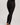 Back view of model wearing Hanro Woolen Silk Long Leg in black showing smooth seams and slim fit