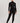 Model wearing Hanro Woolen Silk Long Leg in black with matching turtleneck