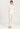 Model wearing Hanro Woolen Silk Long Leg in white with matching turtleneck