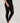 Model wearing Hanro Woolen Silk Long Leg in black showing full length and elastic waistband