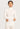 Model wearing Hanro Woolen Silk Turtleneck in white showing roll-neck collar and smooth fit
