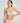 Caffee Heart-shaped padded foam bra in soft white with seamless finish, underwire support, and multi-way straps.