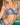 Woman wearing I.D. Sarrieri Blooming Desire navy lace bra and brief, front view