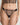 Model wearing the I.D. Sarrieri Love Potion Thong in black featuring embroidered lace, sheer mesh, a low-rise fit, and minimal coverage.