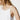 close-up detail of the Kacy knitted cotton gown in white by Pluto showing the strap finish and neckline