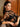 Model wearing Lise Charmel Desir et Volupté Blouse in black showing scalloped embroidery and silk collar