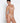 Model wearing Lise Charmel Revelation Beauté wireless non-padded tulle bra in beige crafted from sheer tulle