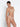 Model wearing Lise Charmel Revelation Beauté wireless non-padded tulle bra in beige crafted from sheer tulle