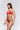 Model wearing red lace Italian briefs with orange adjustable straps by Andres Sarda