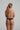 Marie Jo Color Studio lace thong in black with seamless finish for a sleek, invisible fit and flattering everyday comfort.