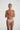 Marie Jo Color Studio lace thong in nude with seamless finish for a sleek, invisible fit and flattering everyday comfort.