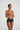 Marie Jo black high-waisted shaping briefs with seamless finish and airy fabric for invisible support under any outfit.