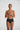 Marie Jo black high-waisted shaping briefs with seamless finish and airy fabric for invisible support under any outfit.
