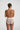 Marie Jo pink high-waisted shaping briefs with seamless finish and airy fabric for invisible support under any outfit.