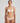 Marie Jo Rio briefs in beige with feather-light fabric, seamless back, Brazilian cut, and elegant pearl strap detail.