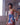 Model wearing Marjolaine Becky Silk Mini Nightie in Bleu Ciel with floral lace neckline and hem