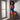 Model wearing Marjolaine Becky Silk Nightdress in Bleu Céleste with lace-trimmed V-neckline and thigh slit