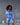 Model wearing Marjolaine Betty Silk Satin Short Robe in Bleu Ciel with crossover neckline and waist belt