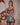 Model wearing the Marjolaine Diane silk mini nighty in turquoise with burgundy floral lace trim.