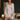 Model wearing the Marjolaine Tess Short Silk Robe in ivory featuring smooth silk satin, floral lace cuffs, a wrap-front design, long sleeves, and a self-tie waist belt.