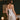 Back view of the Marjolaine Tess Silk Nighty in ivory showcasing smooth silk satin, delicate floral lace back detail, adjustable spaghetti straps, and a feminine above-the-knee fit.