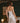 Back view of the Marjolaine Tess Silk Nighty in ivory showcasing smooth silk satin, delicate floral lace back detail, adjustable spaghetti straps, and a feminine above-the-knee fit.