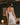 Back view of the Marjolaine Tess Silk Nighty in ivory showcasing smooth silk satin, delicate floral lace back detail, adjustable spaghetti straps, and a feminine above-the-knee fit.