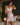 Model wearing the Marjolaine Tess Silk Nighty in ivory featuring smooth silk satin, floral Calais lace at the neckline and hem, adjustable spaghetti straps, and an elegant above-the-knee silhouette.