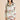 Silk long pajama set in Maugham floral print with pearl buttons, olive piping, and a notched collar for timeless luxury and comfort.