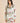 Silk long pajama set in Maugham floral print with pearl buttons, olive piping, and a notched collar for timeless luxury and comfort.