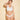 White Cosabella Never Say Never Cutie thong in soft Italian lace, low-rise with scalloped edges, one size, gift-wrapped with bow.