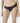 Model wearing black NUEAME Brazilian Flower Lace Briefs with smooth panel and lace sides.