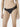 Model wearing black NUEAME Brazilian Flower Lace Briefs with smooth panel and lace sides.