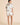 Olivia von Halle Ingo Cora ivory silk short pajama set with goldfish print and black piping from the back