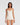 Model wearing Oscalito wool and silk V-neck camisole in ivory with satin trim showing neckline and fit