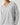 Close-up of the Pluto Alena V neck long sleeve pajama top made from a soft cotton modal blend.