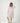Dusty pink cotton gown with mandarin collar and button placket,