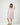 Dusty pink cotton gown with mandarin collar and button placket,