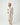 Beige knitted cotton robe with black trim, shawl collar, and tie waist, front view