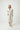 Beige knitted cotton robe with black trim, shawl collar, and tie waist, front view