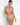 Model wearing Revelation Beauté Full Cup Bra in beige by Lise Charmel with sheer tulle and vertical seams.