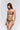 Front view of Sarda Shay mini thong in black with sheer floral embroidery and Swarovski® crystal details