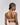 Back view of the Sarda Tegla padded wireless bralette in Light Tan with adjustable straps and hook closure.