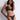 Model wearing the Secret Language Triangle Bra & Thong by Aubade in Fantasy with a plunging neckline, longline underband, and minimal thong with gold eyelets